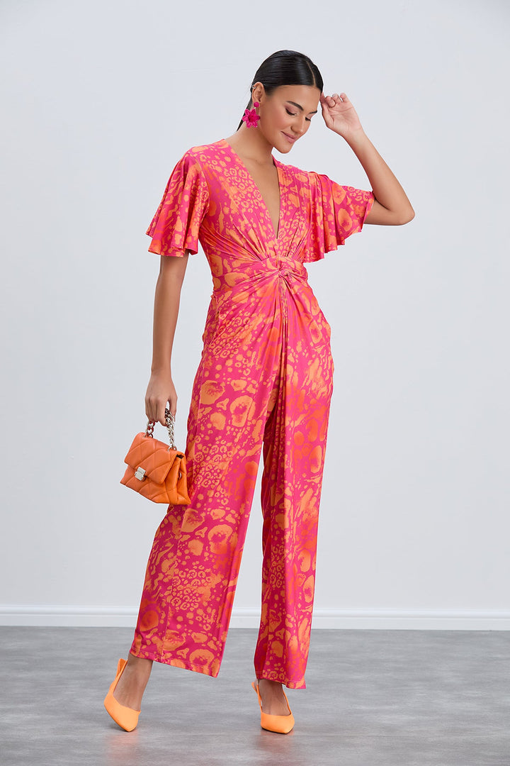Angel Sleeve Twist Maxi Jumpsuit in Tropical Fuchsia print - jqwholesale.com