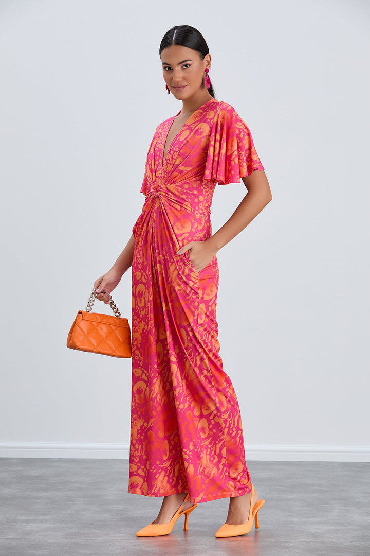 Angel Sleeve Twist Maxi Jumpsuit in Tropical Fuchsia print - jqwholesale.com