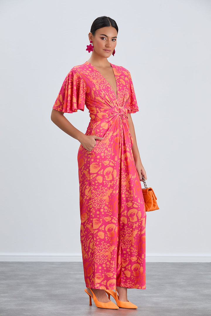 Angel Sleeve Twist Maxi Jumpsuit in Tropical Fuchsia print - jqwholesale.com