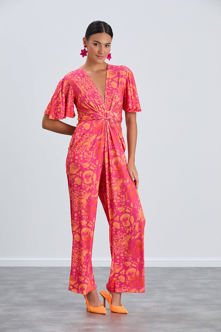 Angel Sleeve Twist Maxi Jumpsuit in Tropical Fuchsia print - jqwholesale.com