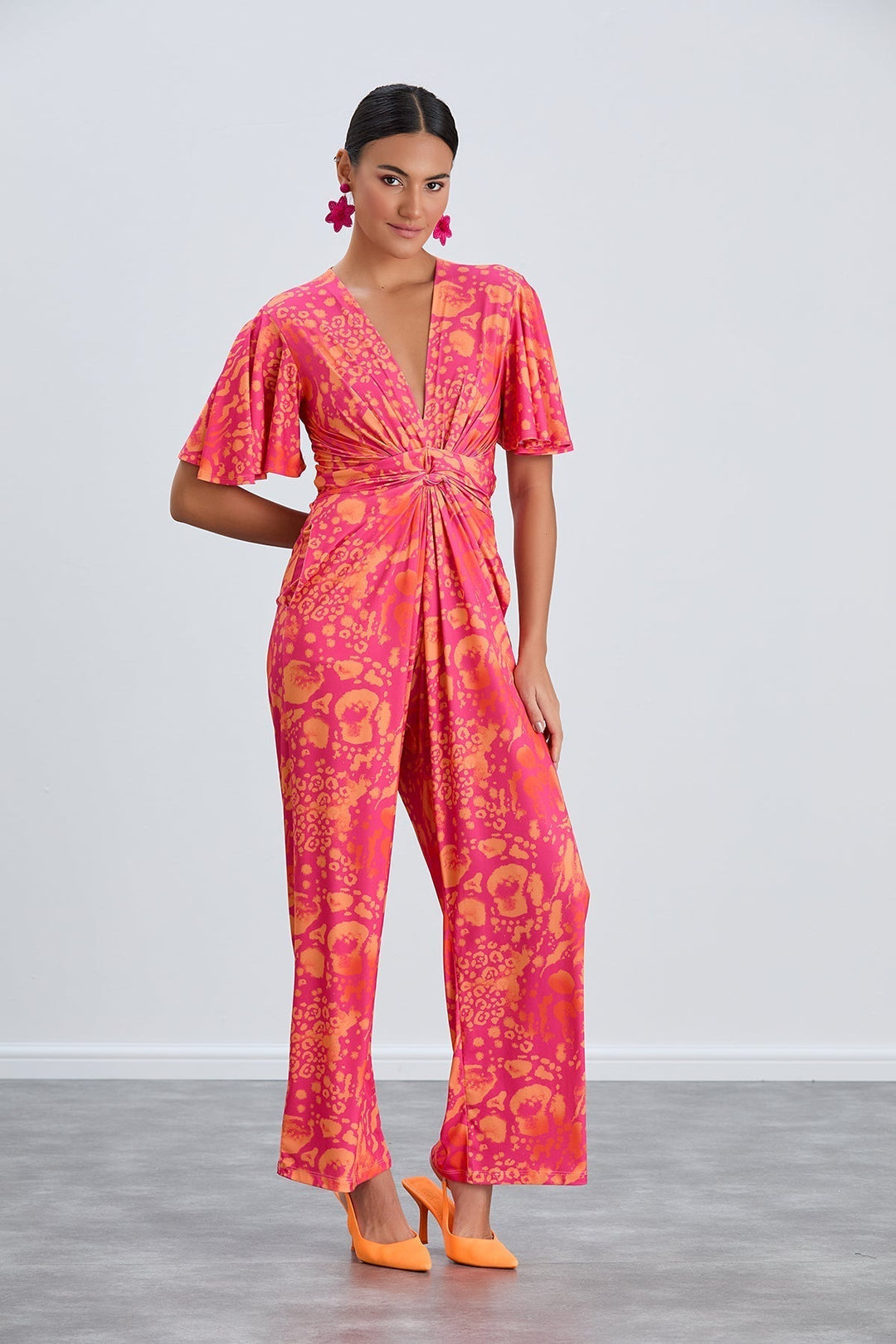 Tropical Fuchsia Angel Sleeve Maxi Jumpsuit with Twist Detail - jqwholesale.com