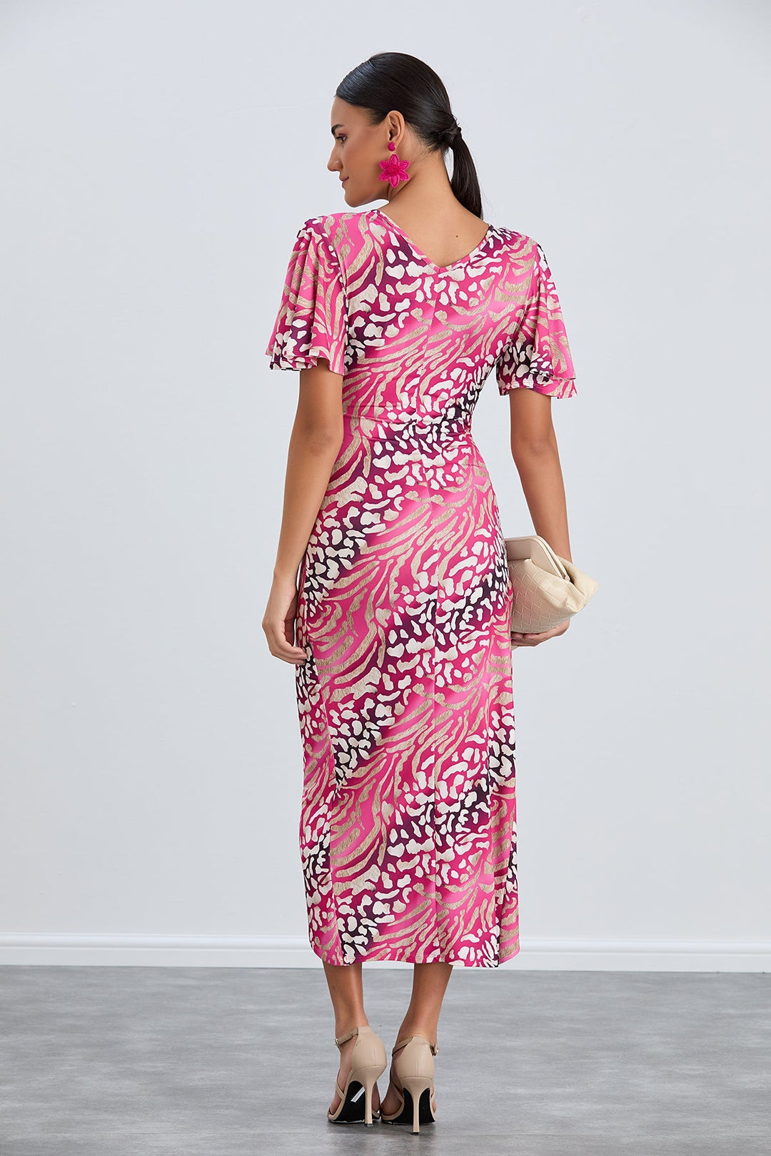Flirty Flutter Sleeve Wrap Midi Dress in Fuchsia Animal Print - jqwholesale.com