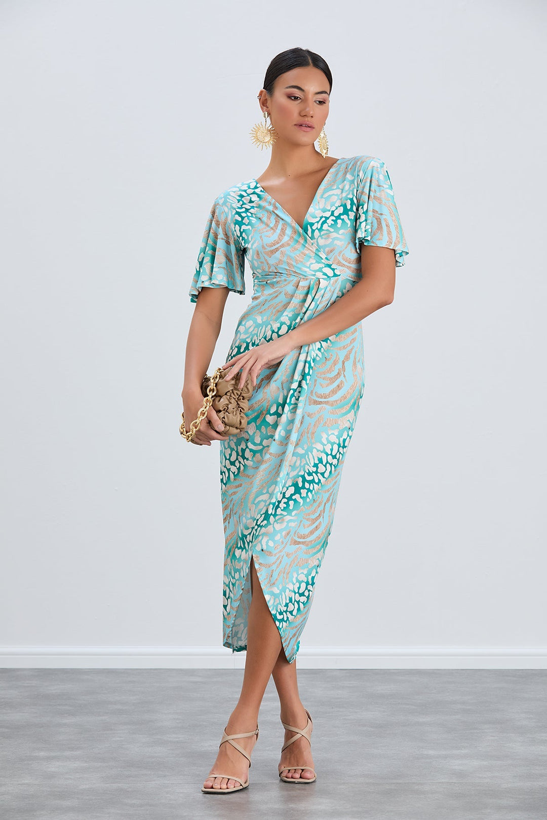 Flirty Flutter Sleeve Wrap Midi Dress in Mint Animal Print - jqwholesale.com