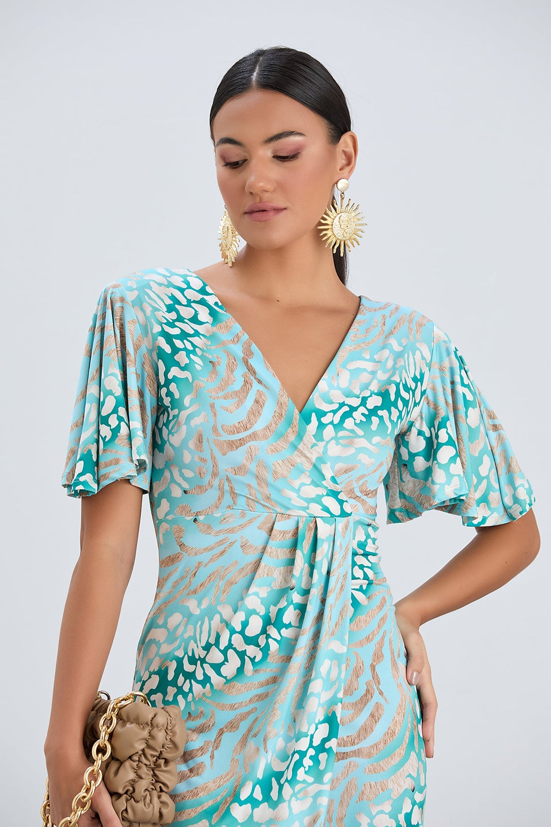 Flirty Flutter Sleeve Wrap Midi Dress in Mint Animal Print - jqwholesale.com