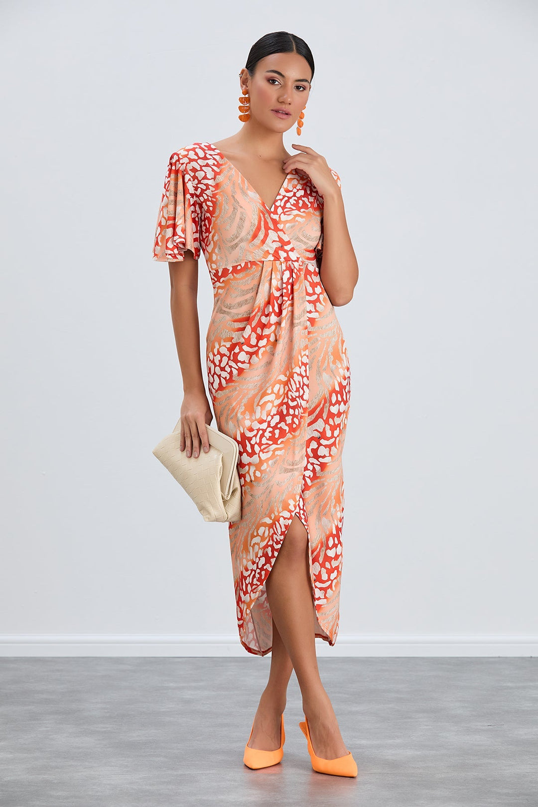 Flirty Flutter Sleeve Wrap Midi Dress in Orange Animal Print - jqwholesale.com