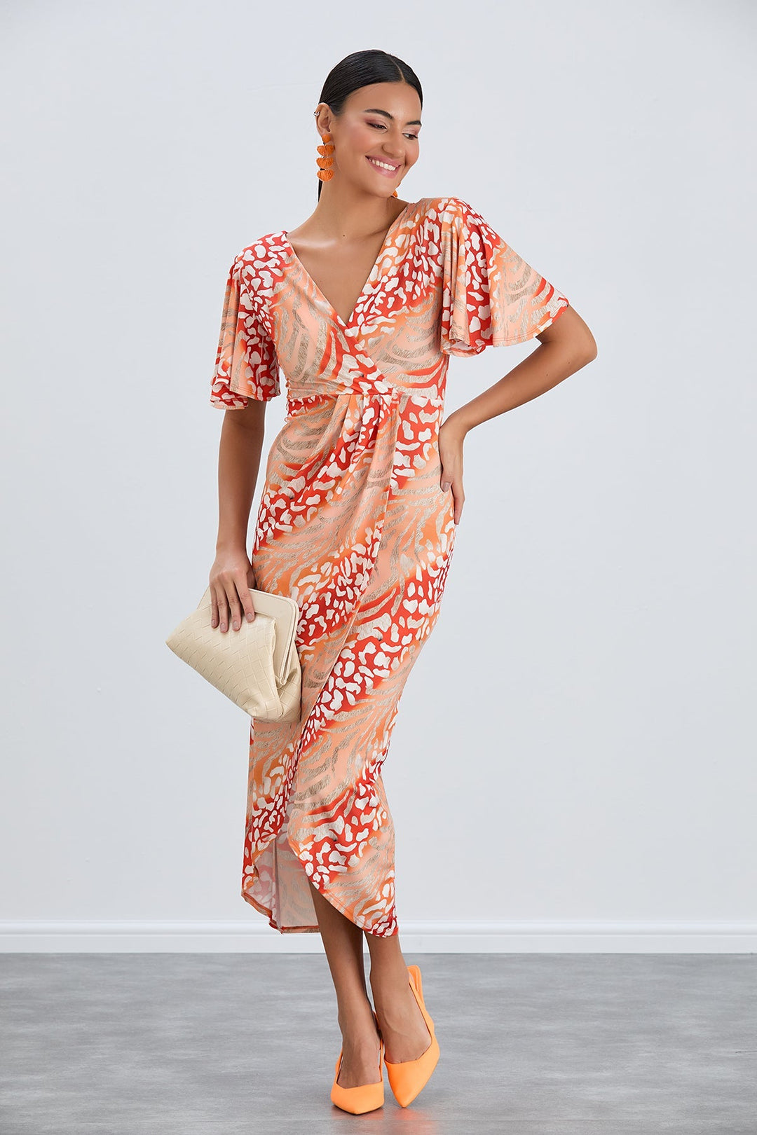 Flirty Flutter Sleeve Wrap Midi Dress in Orange Animal Print - jqwholesale.com