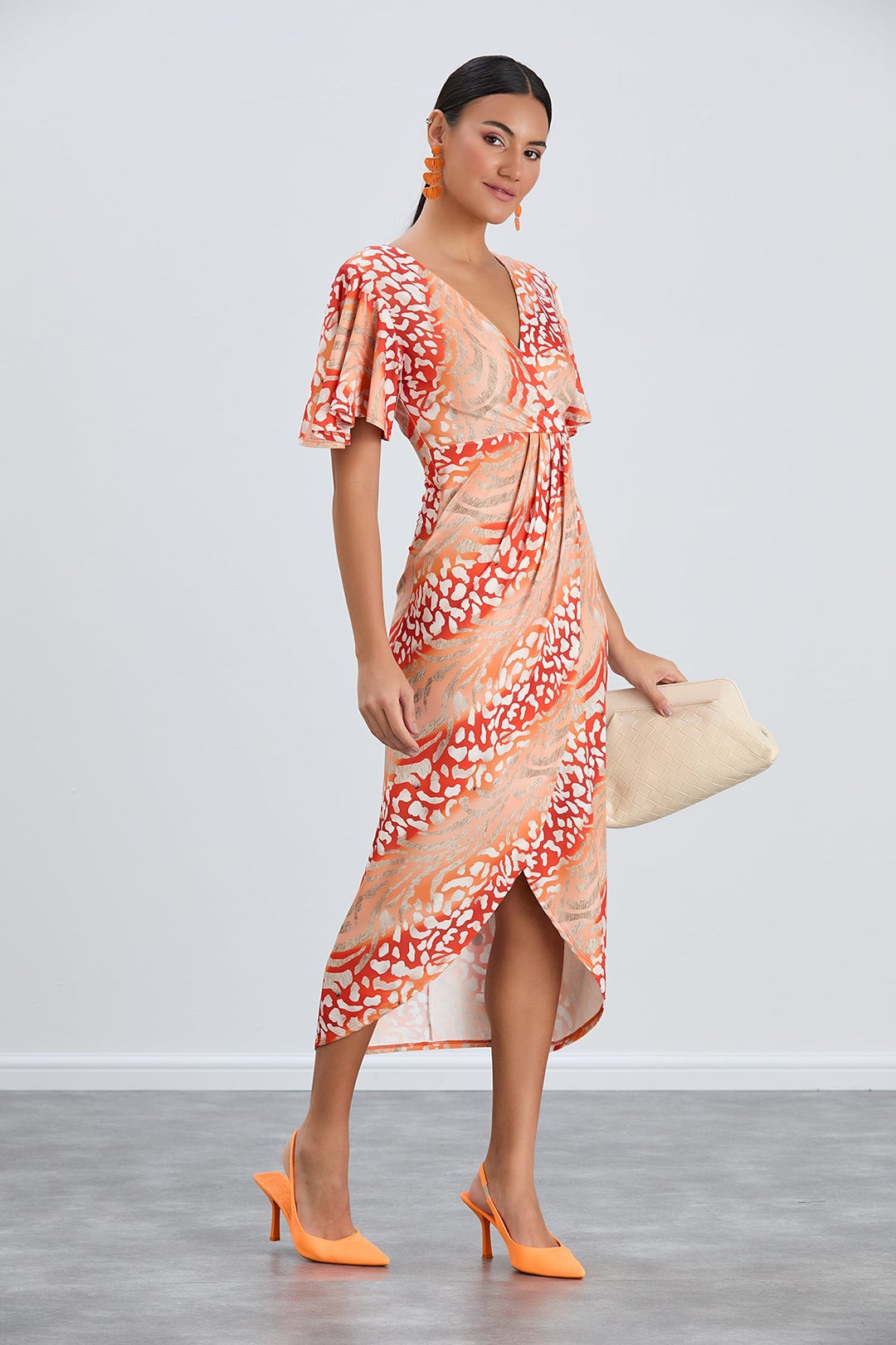 Flirty Flutter Sleeve Wrap Midi Dress in Orange Animal Print - jqwholesale.com