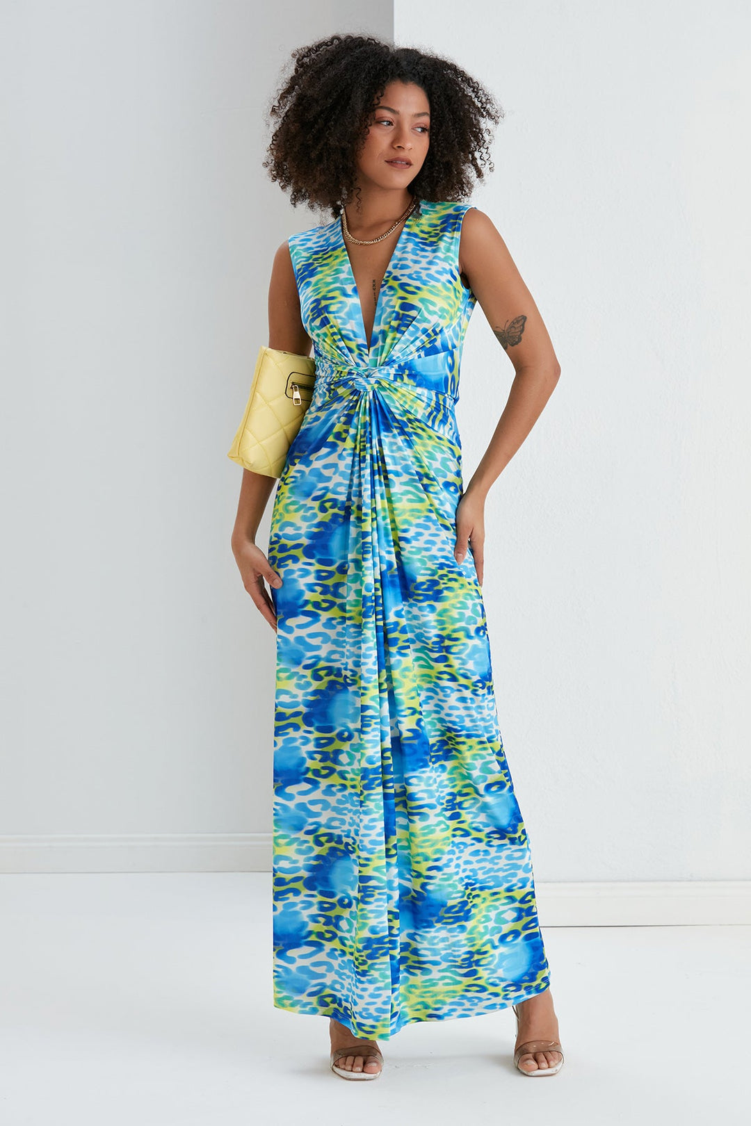 Sleeveless Twist Wrap Maxi Dress in Blue Leopard print - jqwholesale.com