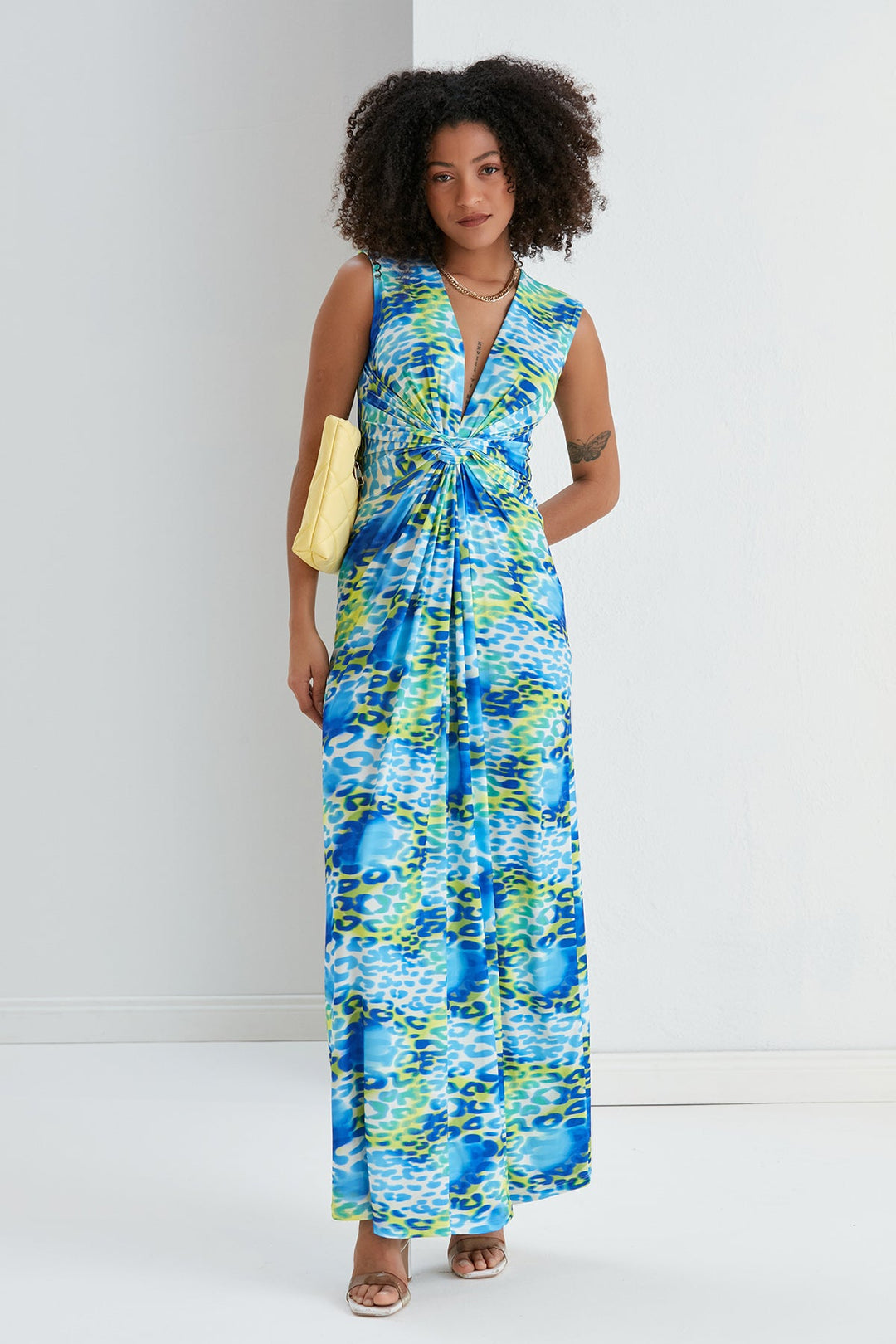 Sleeveless Twist Wrap Maxi Dress in Blue Leopard print - jqwholesale.com