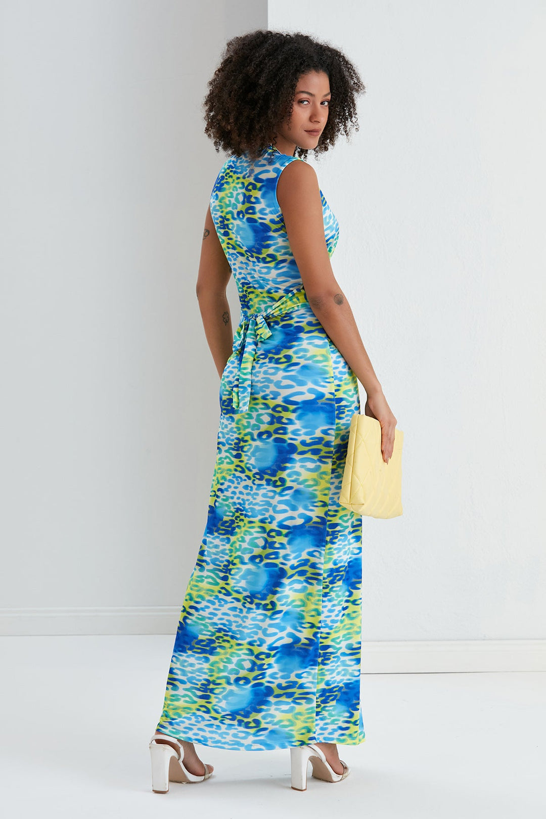 Sleeveless Twist Wrap Maxi Dress in Blue Leopard print - jqwholesale.com