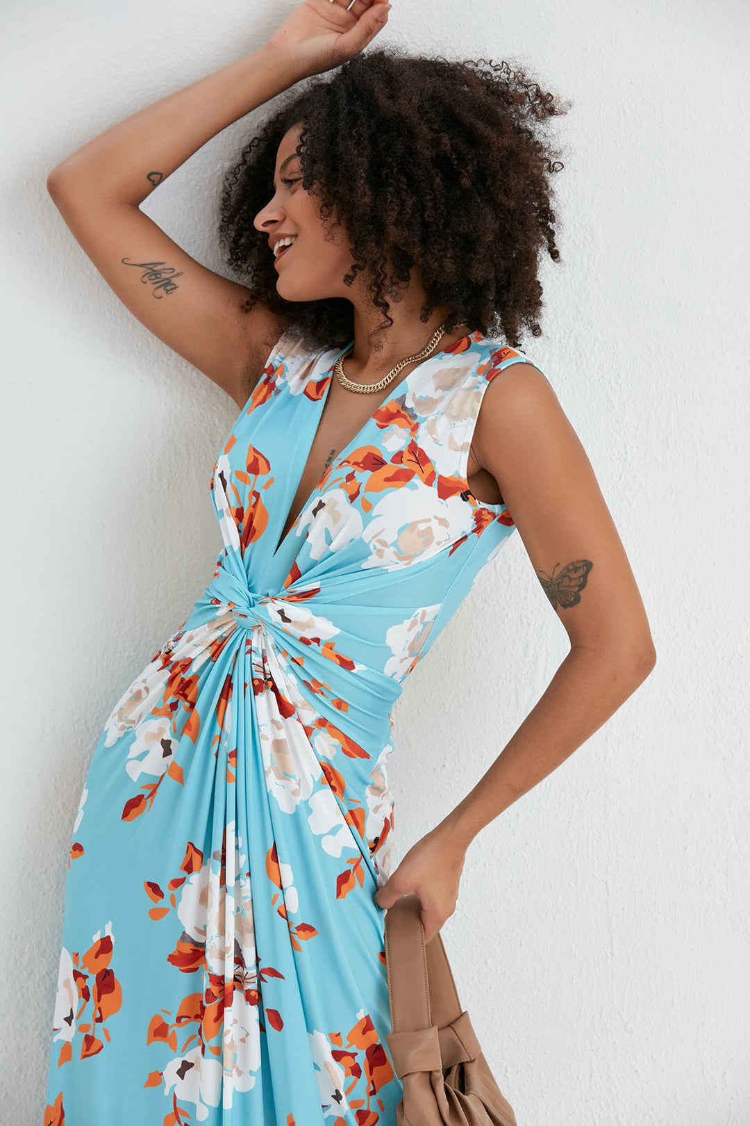 Sleeveless Twist Wrap Maxi Dress in Blue Floral print - jqwholesale.com