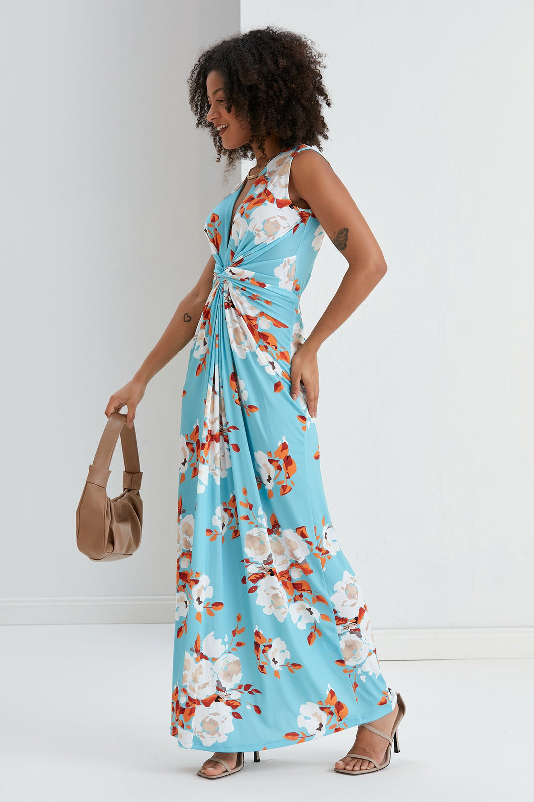 Sleeveless Twist Wrap Maxi Dress in Blue Floral print - jqwholesale.com