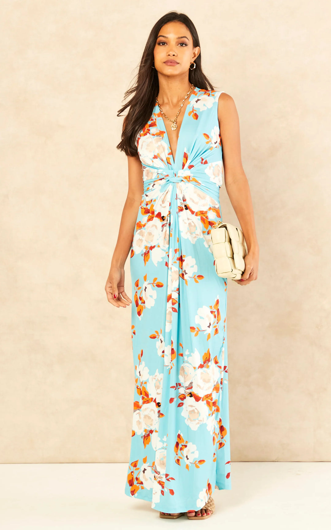 Sleeveless Twist Wrap Maxi Dress in Blue Floral print - jqwholesale.com