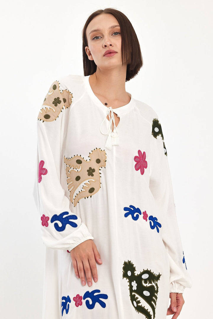 Embroidered Maxi Dress with Statement Motifs in White