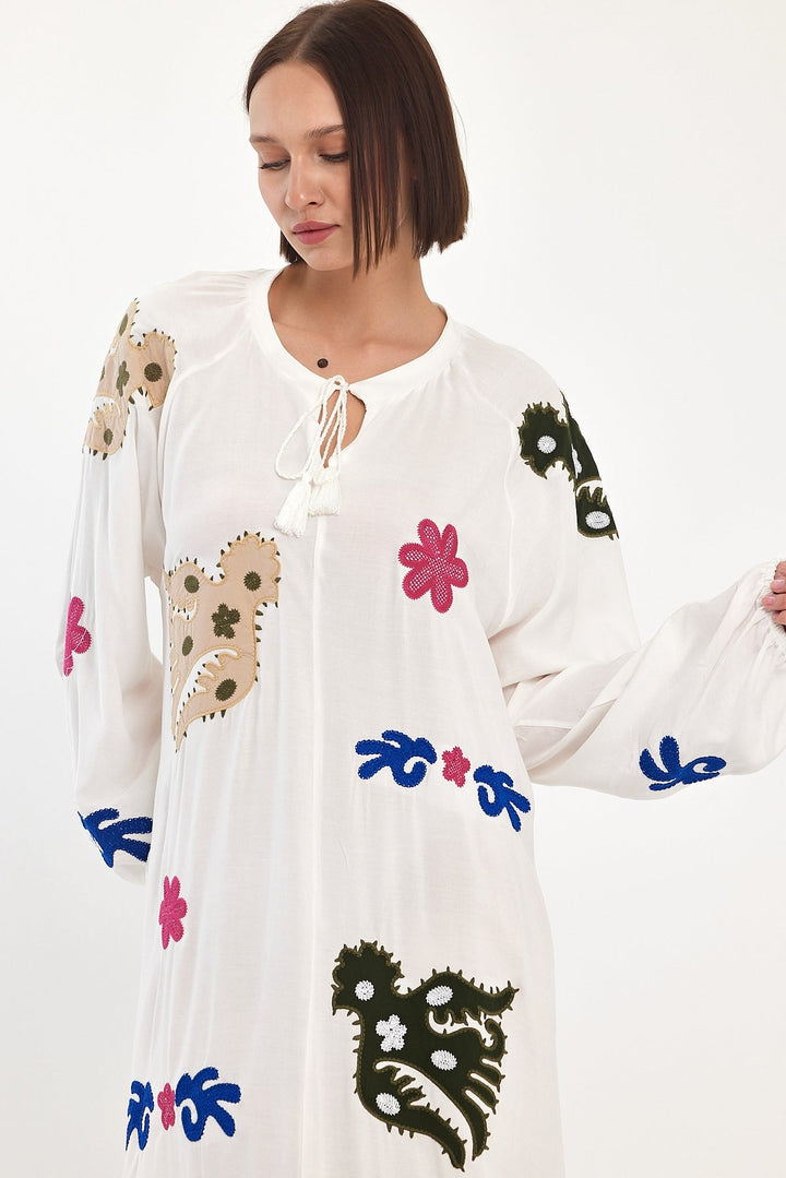 Embroidered Maxi Dress with Statement Motifs in White