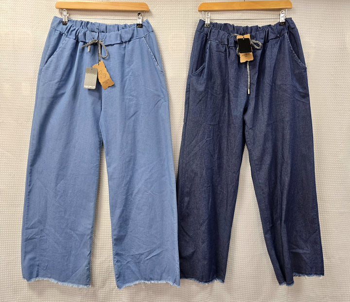 Wide Leg Frayed Hem Denim Magic Trousers - jqwholesale.com